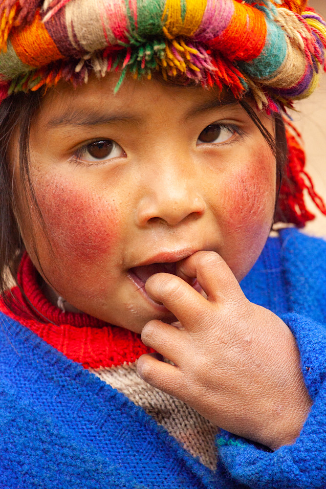 Cute child with blue sweater in Peru | Nicki Geiget