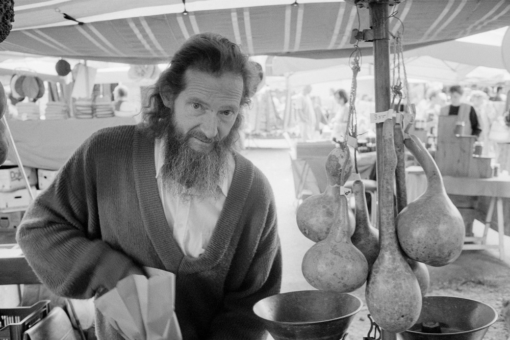 La Salle, France - 3 August 1998. A farmer and vendor in the Cévennes selling his produce on market day in Lasalle.