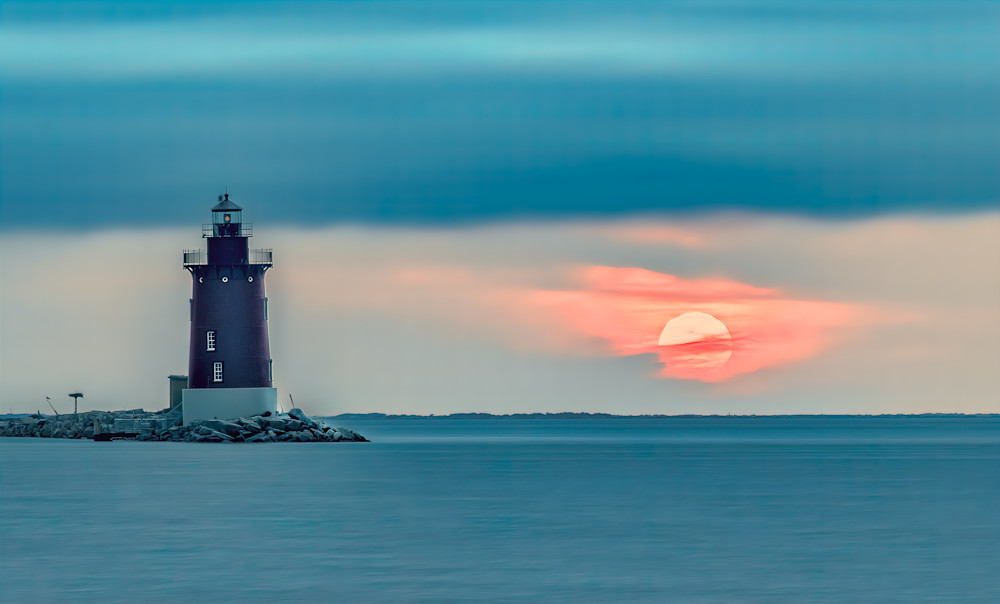 Sun Sets Behind Cape Henlopen Lighthouse