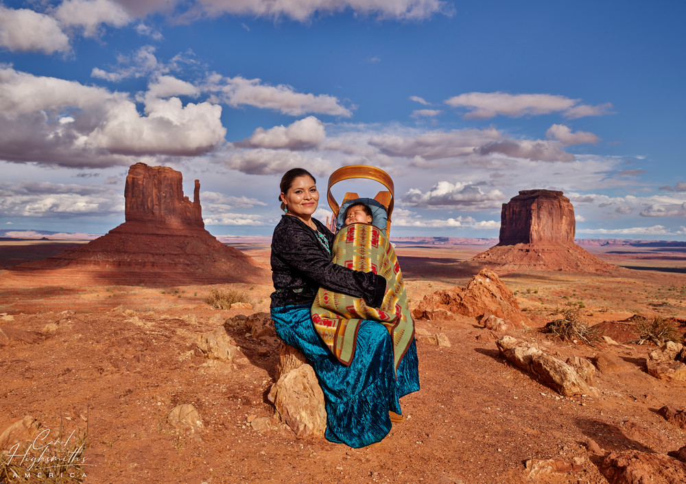 Navajo tribal member Monument Valley Eula M. Atene and 3 month old boy Leon Clark, holding her infant child, poses in Monument Valley, a red-sand desert wonderland that is part of the Navajo National Tribal Park on the Arizona-Utah border.  Renowned