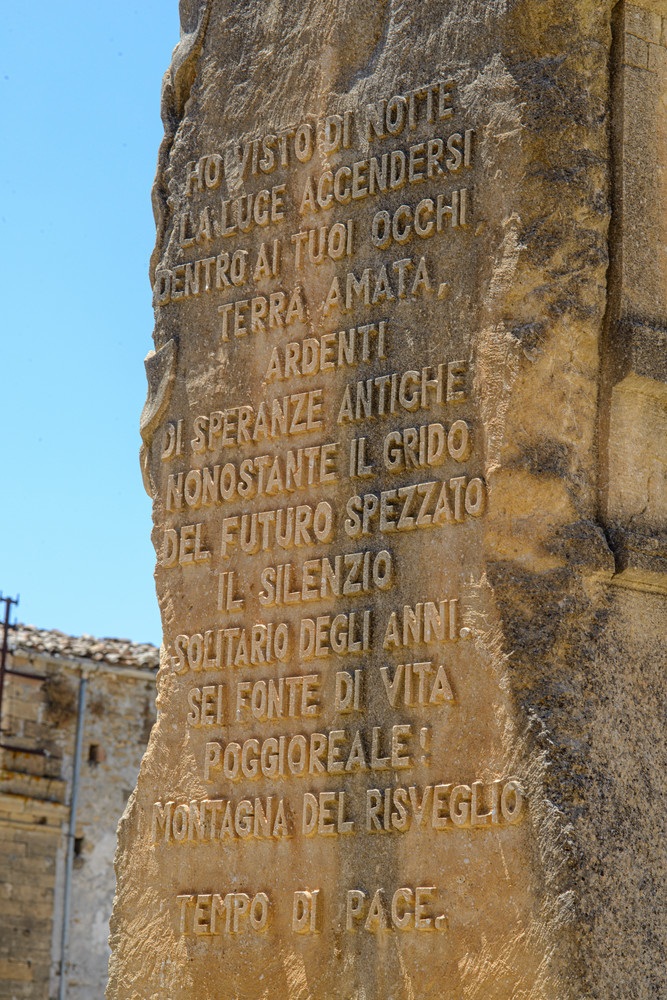 Inscription on eight foot baroque statue artifact in Poggioreale, Sicily in 2019