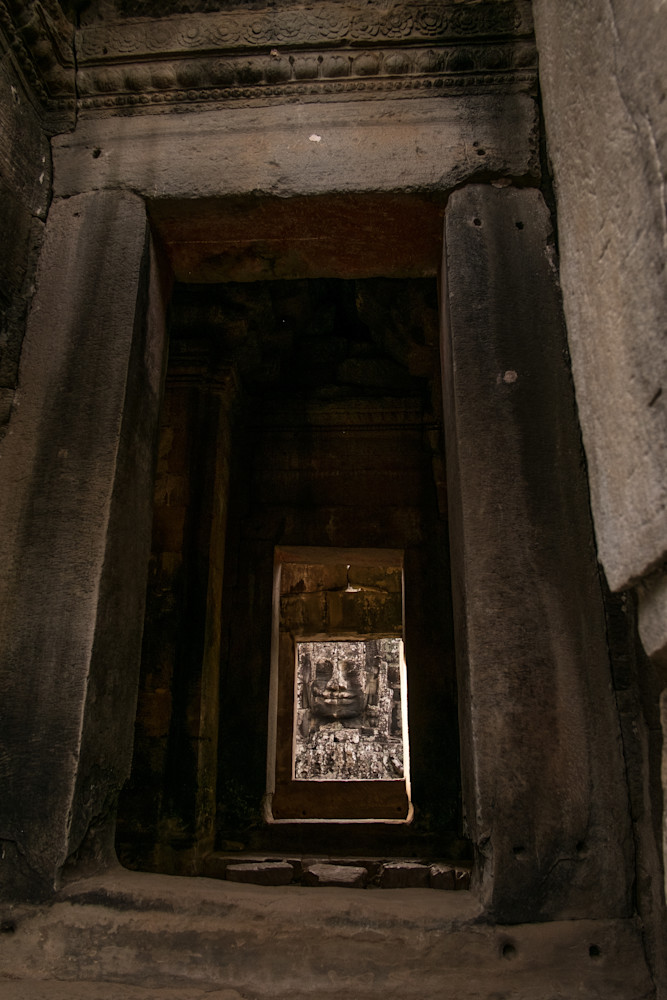 Buddha's face through temple doorways
