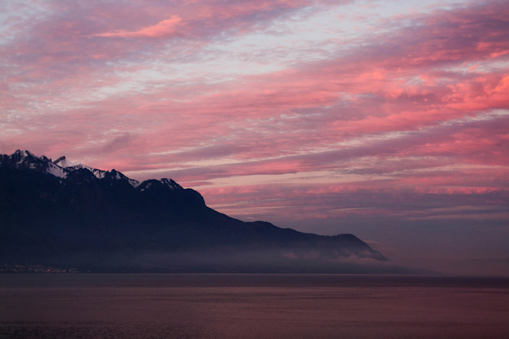 Fine art landscape photograph of the winter pink sunrises over Lake Geneva in Switzerland by Allison Davis