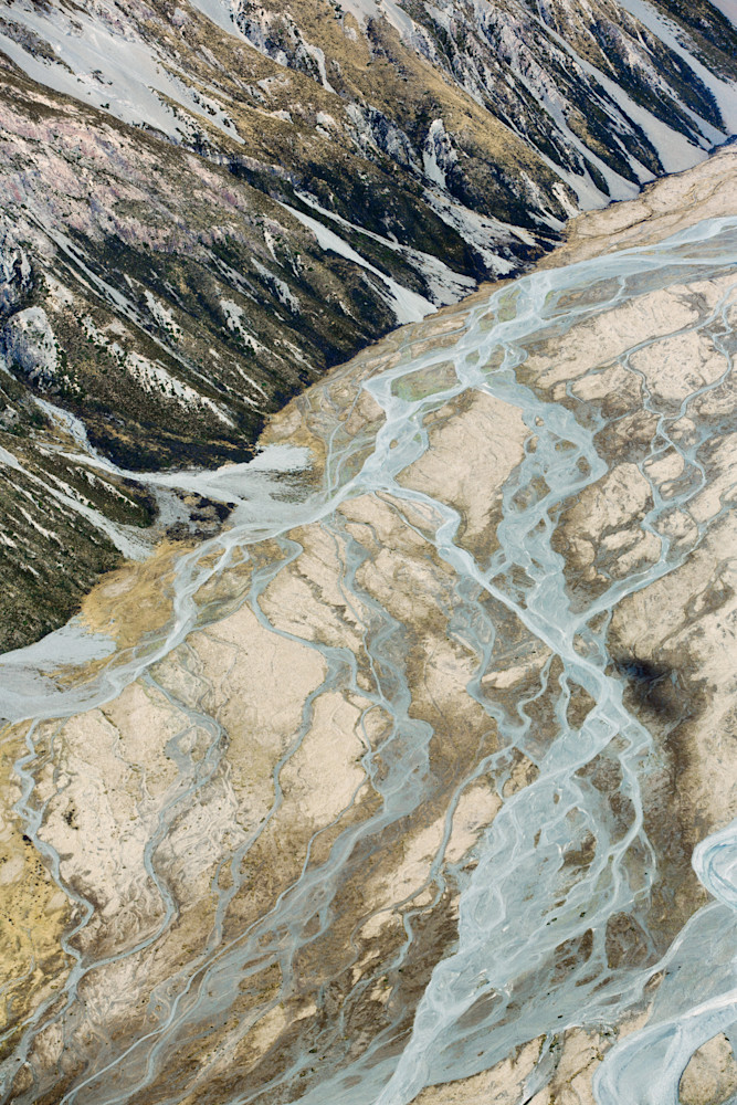A beautiful aerial abstract photograph of the New Zealand Glacial rivers by travel and fine art photographer Allison Davis
