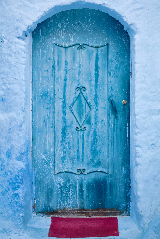 Blue Door with Red Doormat