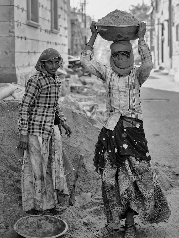 A limited-edition platinum palladium photography print of two hard working women in traditional dress on the street of Jodhpur, India.