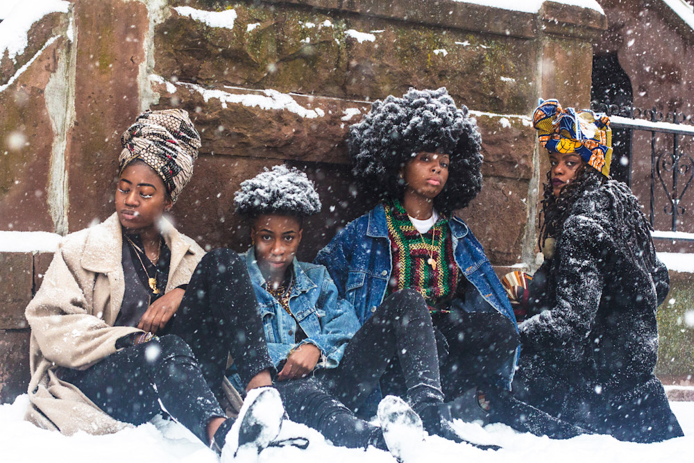 Four African Women in the Snow