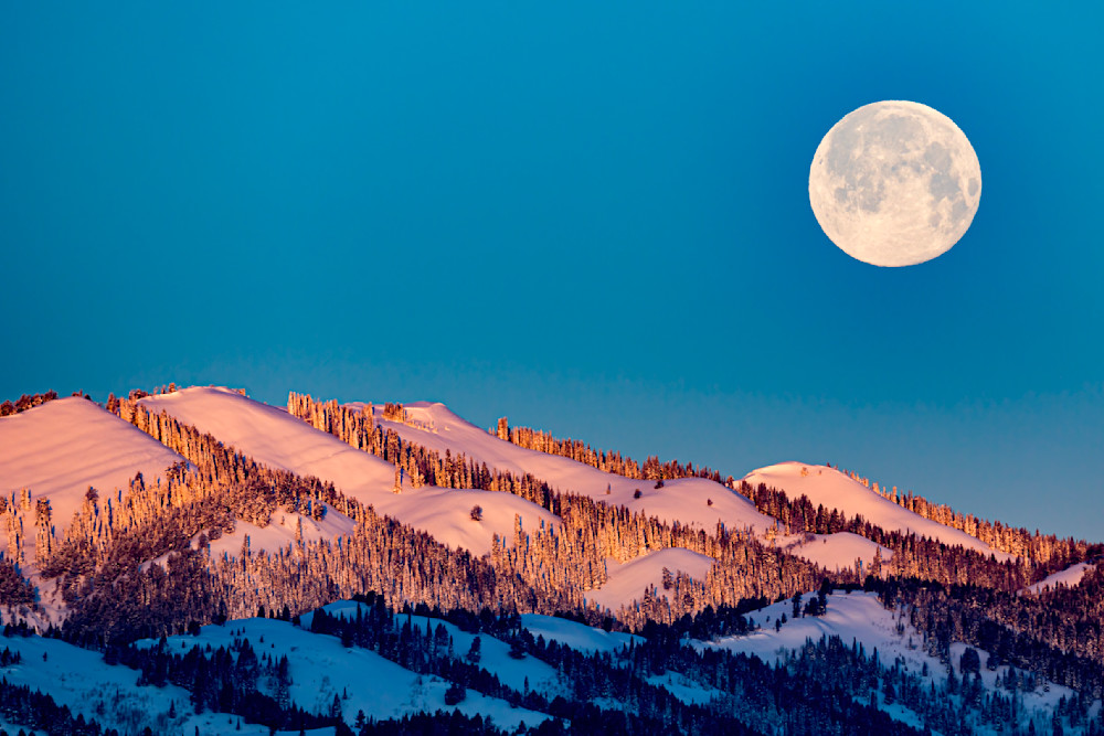 February 9, 2020 - Victor, ID: The Super Snow Moon setting over the Big Hole Mountains.