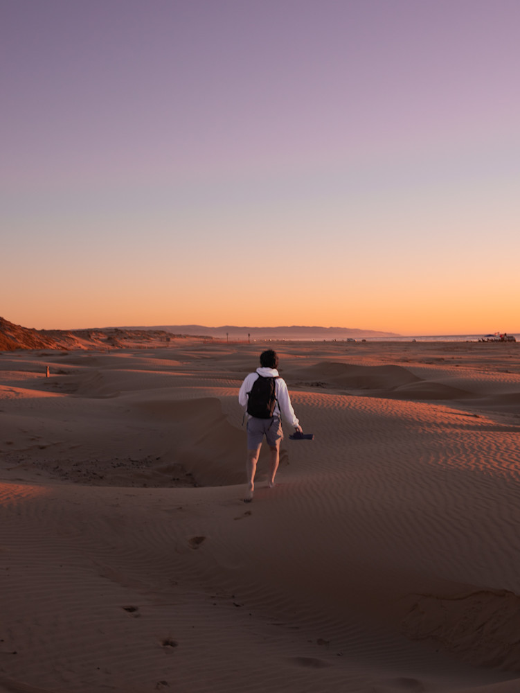 A single hiker on the Pismo Dunes