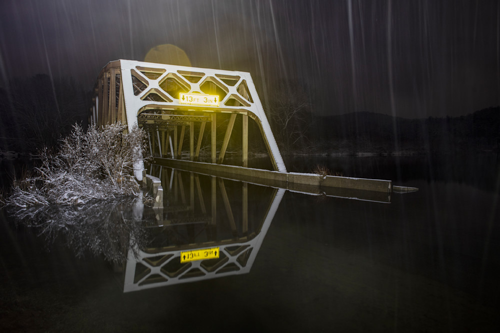 The Nebraska bridge under water during the flood from a snow melt.