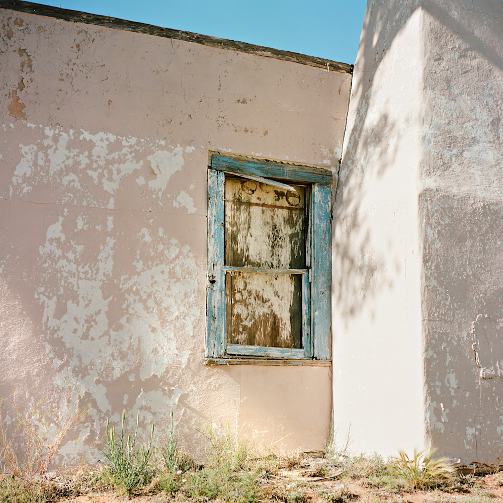 Film photography of abandoned adobe at Elida, New Mexico in afternoon sun