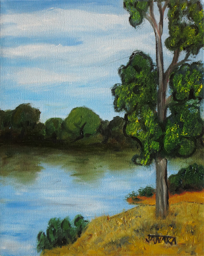 Tree Standing by River