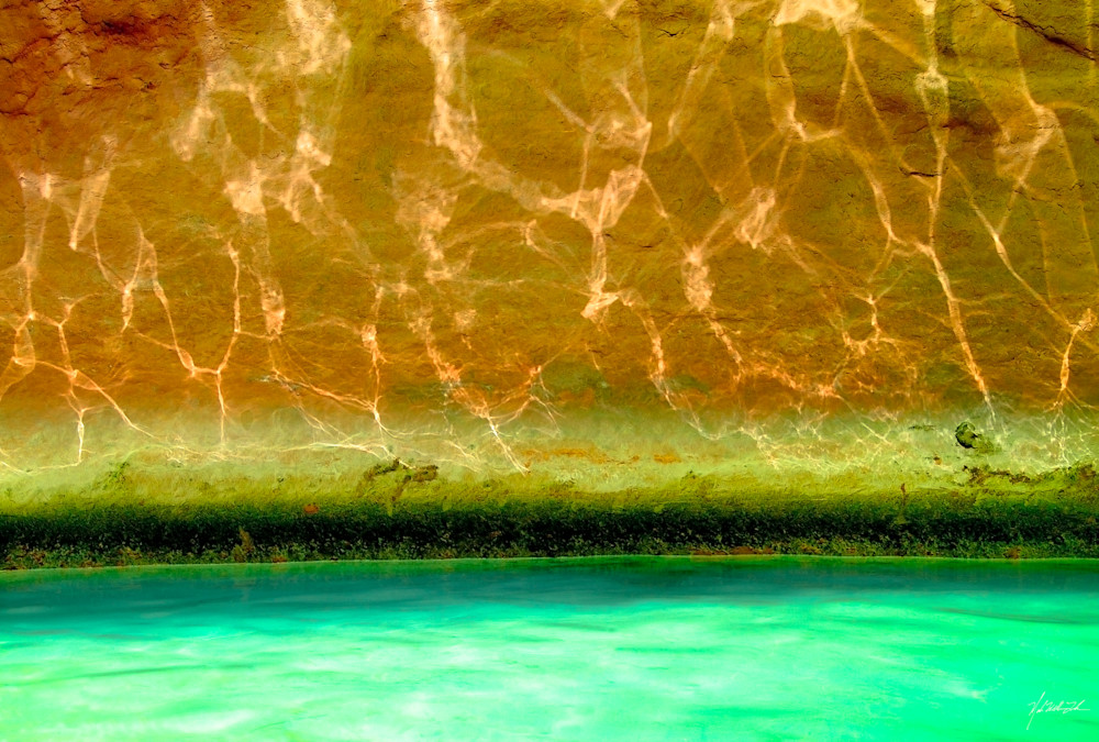 Graphic patterns from the azure water Havasu Creek reflect on the walls of the Grand Canyon.