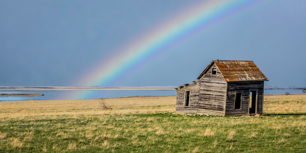 "Beyond The Storm: Rainbow Arch Over Montana's Lost Homestead" Photography Art | D. Robert Franz Photography