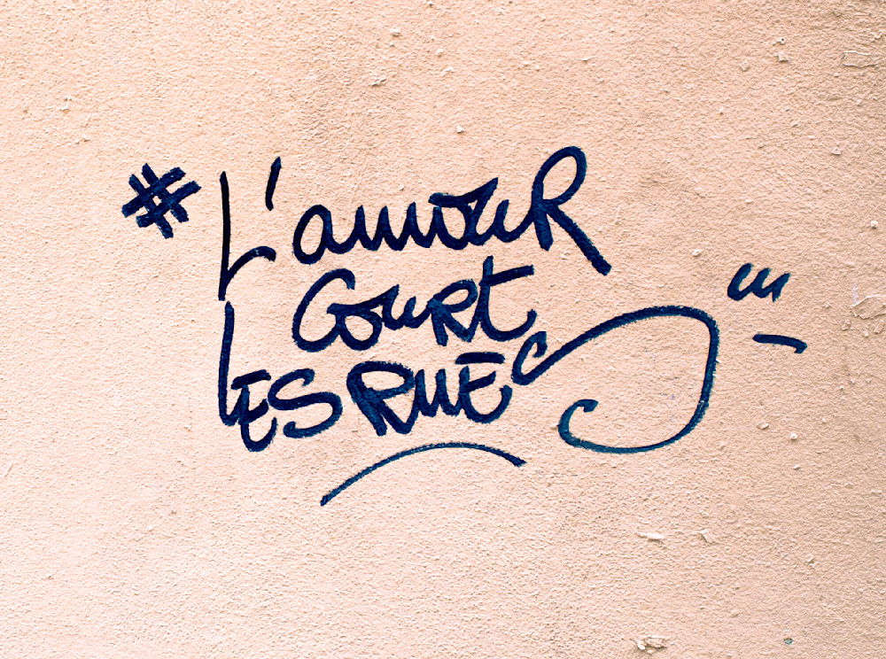 Paris Street Art Life is Unexpected Love Runs Through the Streets