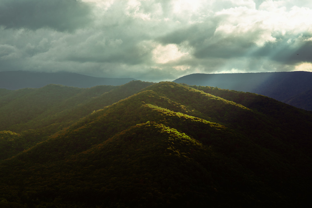 Crepuscular rays break through over Monongahela National Forest, West Virginia Fine Art Print