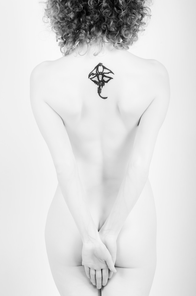 A woman covering her backside