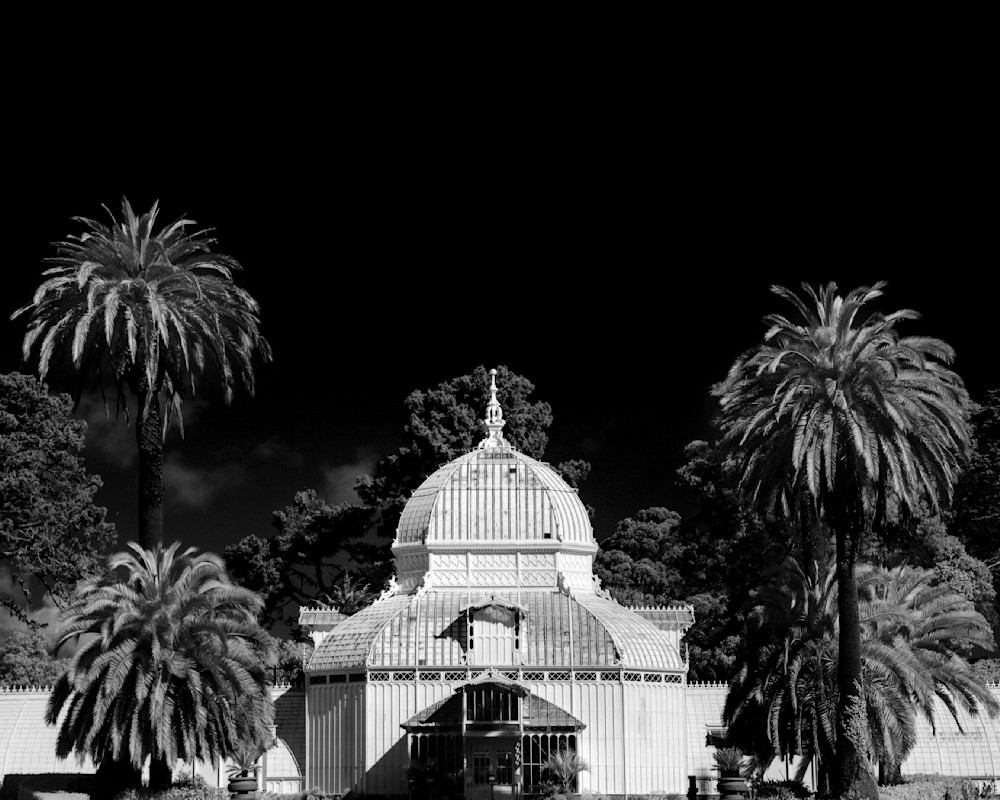 A black and white infrared film photograph of the San Francisco Conservatory of Flowers
