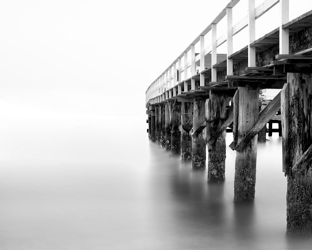 An image of a dock leading into the San Francisco Bay