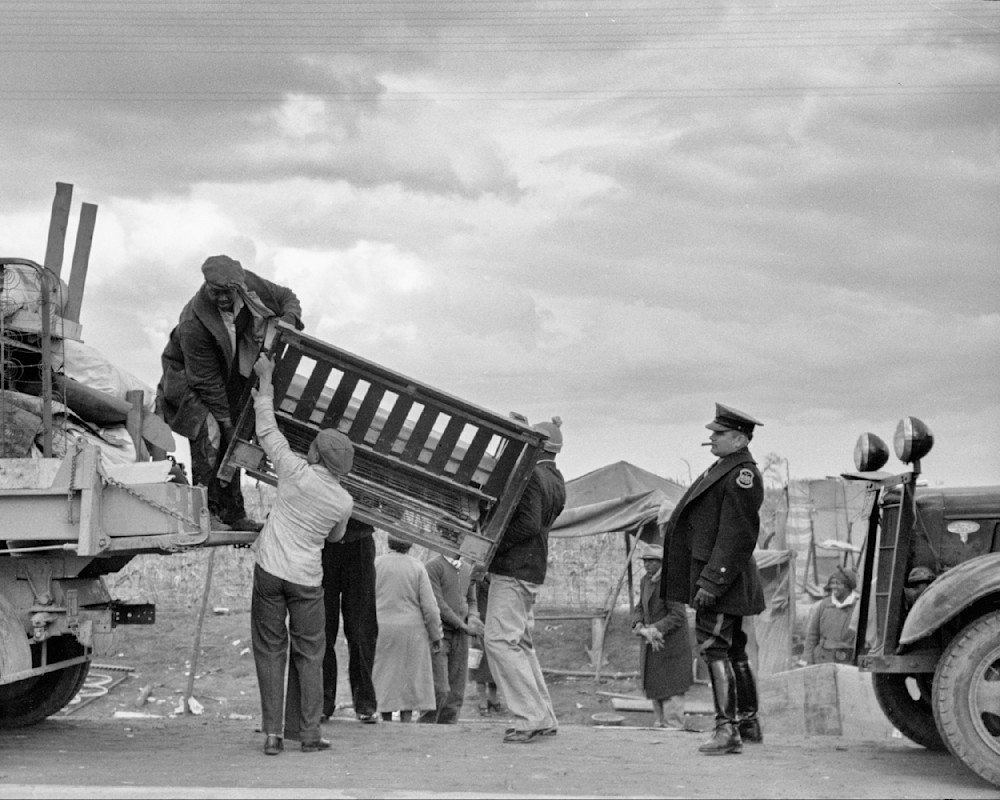 Police Move Evicted Sharecroppers From Roadside. New Madrid County, Mo. 1939  Photography Art | Arthur Rothstein Legacy Project LLC
