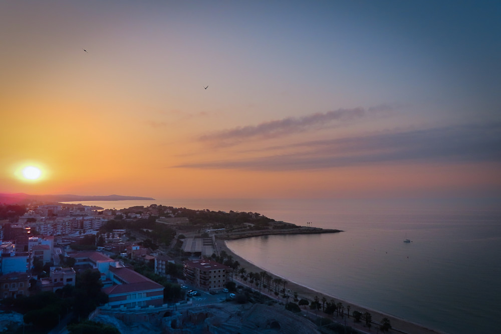 Sunrise over Tarragona on the Mediterranean Sea in Spain | Eugene L Brill