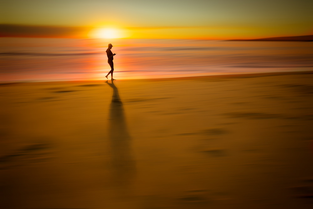 A Walk On The Beach at Sunset