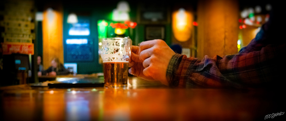 Customer ponders the meaning of a great beer.