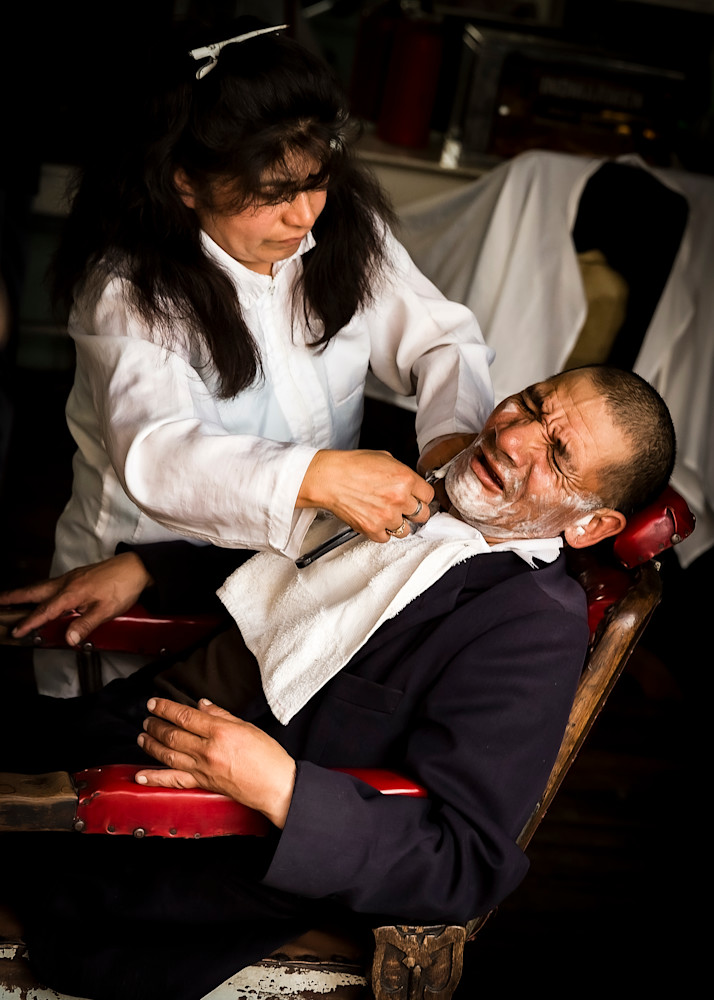 Scott Kasden | Shop photo of man getting close  barber shave
