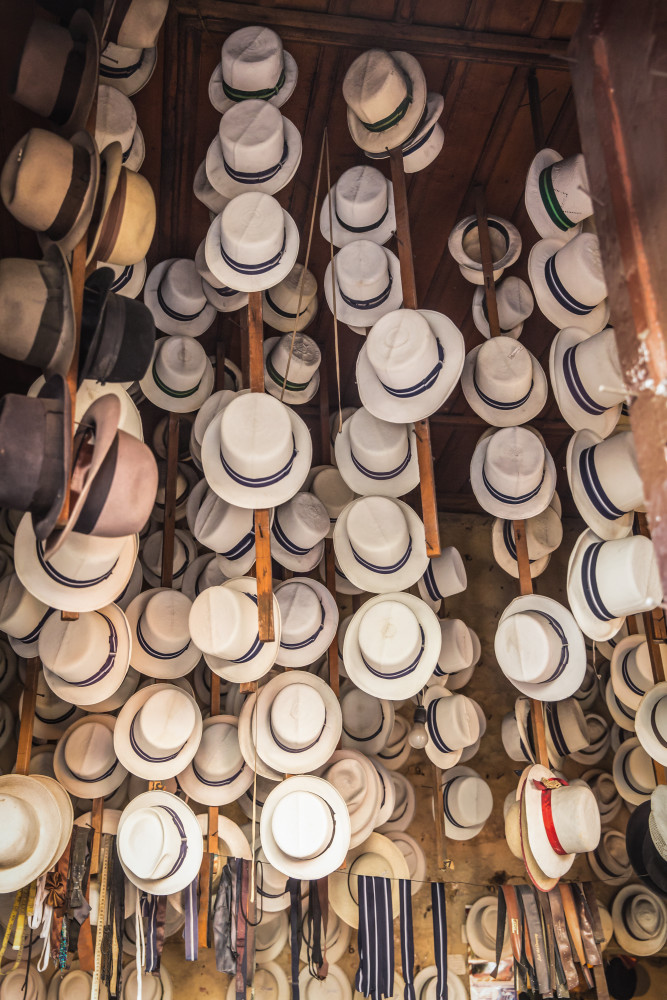 Scott Kasden | Shop art photo of Ecuadorian hat display
