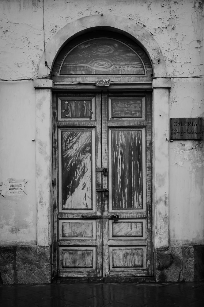 Scott Kasden | Shop B&W photo of decrepit door in Cuenca