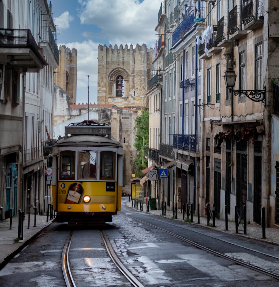 Lisbon's Timeless Journey: The 28 Trolley and Sé Cathedral – Historic Portugal Street Scene | 910Photography