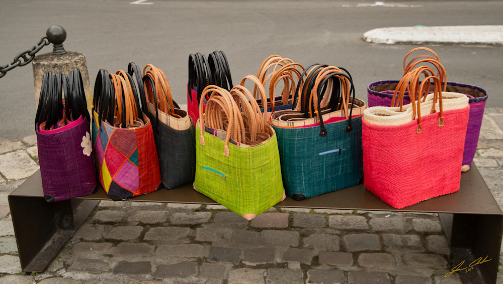 Colorful fabric shopping bags in the marketplace