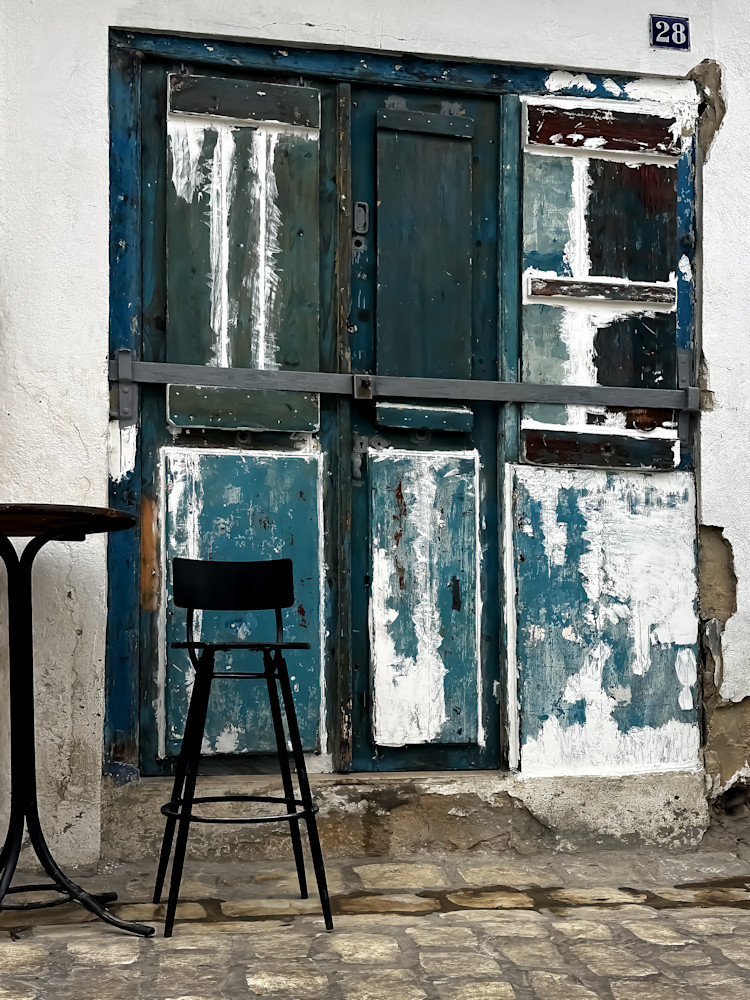 Weathered Chair and Door in Tunis, Tunisia