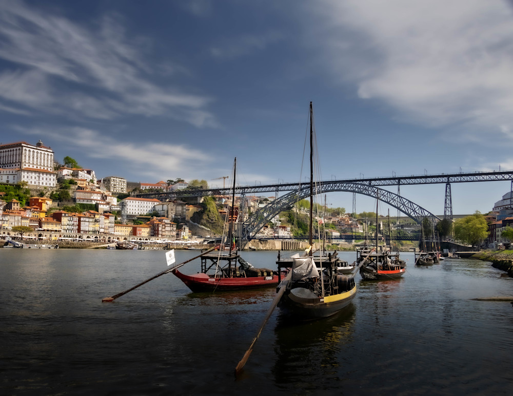 Porto Rabelo Boats and Dom Luís I Bridge on the Douro River – Historic Port Wine Scene