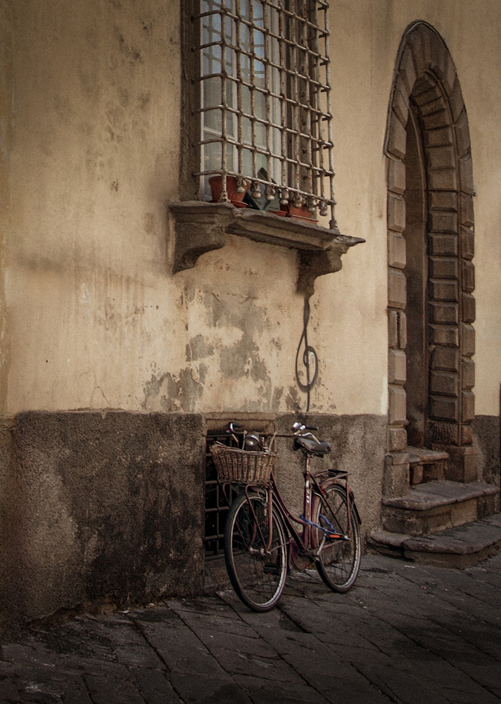 Timeless Wheels of Lucca – Rustic Bicycle Scene in Tuscany