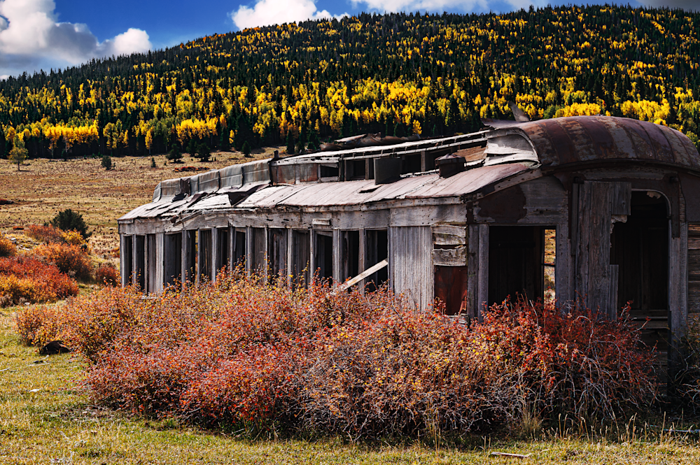 Autumn's Embrace: The Forgotten Train Car Photography
