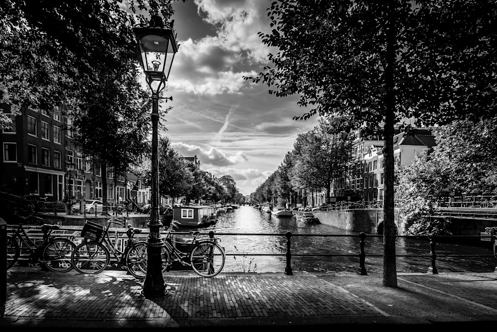 Canal Bridge Amsterdam with Bike and Street Light in Black and White