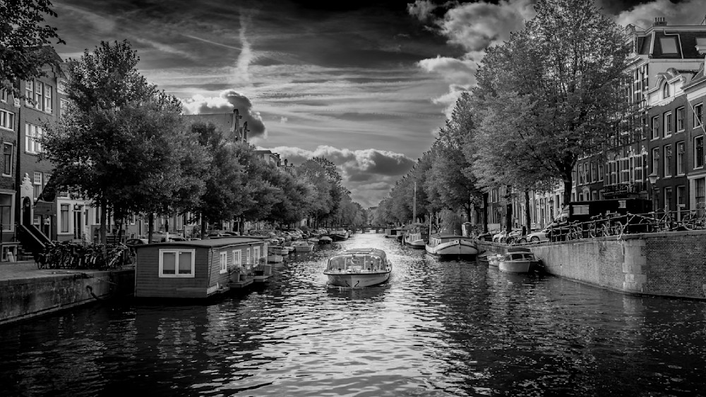 Canal Scene in Historic Amsterdam with Canal Boat