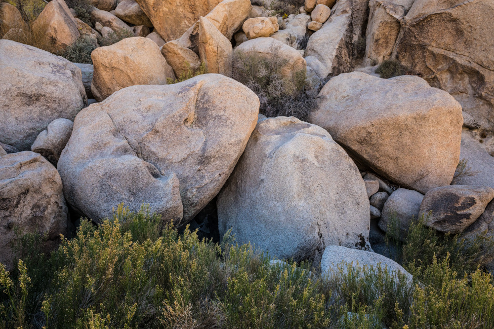 Large boulders on a canyon wall in Rattlesnake Canyon area of Joshua Tree National Park.