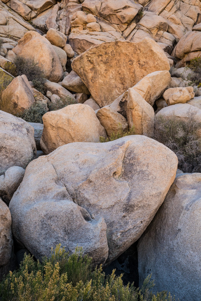 Large boulders on a canyon wall in Rattlesnake Canyon area of Joshua Tree National Park.