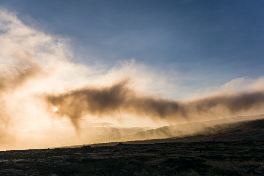 And a dragon swallowed the sun.... VOG (volcanic fog from hotspot eruptions) drifting across the coastal plain, Hawaii Volcanoes National Park, USA.