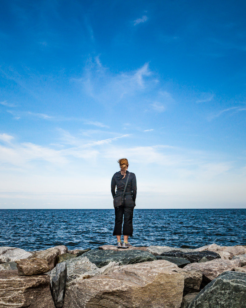 art photography for sale buy artwork online prints for sale woman standing sea wall large body of water