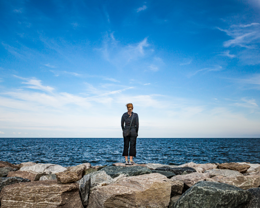 art photography for sale buy artwork online prints for sale woman standing sea wall large body of water