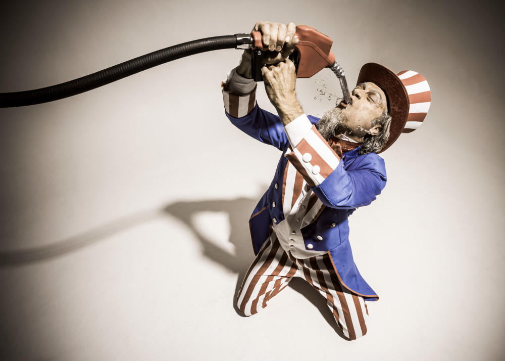 Uncle Sam (Russell Hodgkinson) shoot at Off Broadway Studio with gas pump.