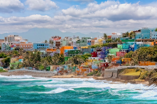 Crashing waves and ocean with colorful houses puerto rico q8wuzs