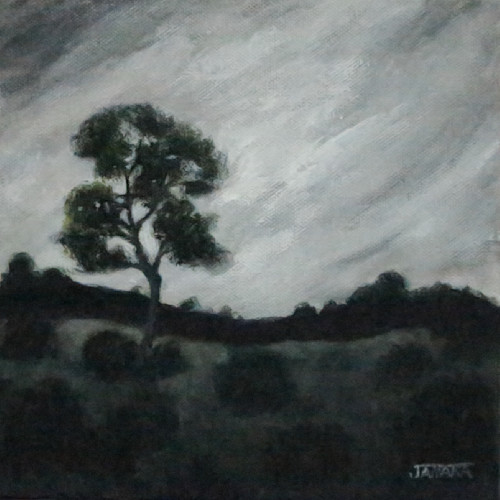 A tree stands alone at the end of a day8x8 2023 vwqdel