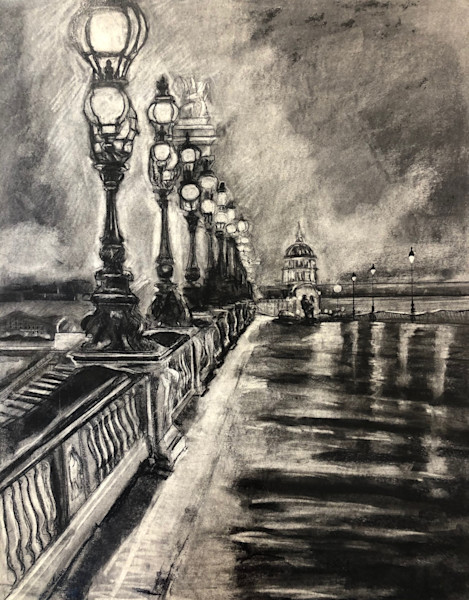Paris Evening Glow” charcoal drawing on 20x14” on Strathmore paper by  Monique Sarkessian with a beautiful woman walking on the bridge at night.