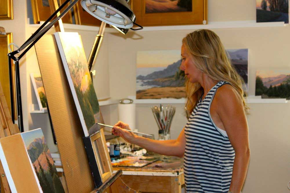 Terry Painting at her easel