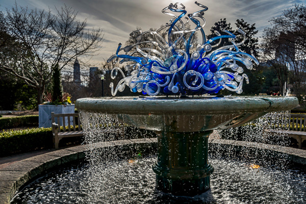 A Chihuly sculpture sits atop a fountain at the Atlanta Botanical Gardens