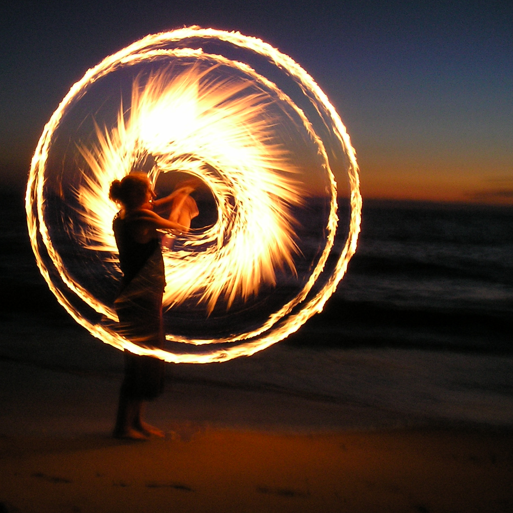 fire dancer at night